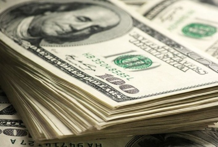 Dólar tem pouca alteração com investidores à espera do Fed