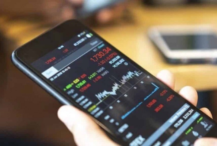 Mercados chineses operam com pouca variação à espera de definições sobre tarifas dos EUA