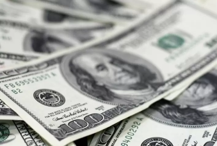 Dólar recua ante real com exterior otimista; moeda caminha para perda semanal